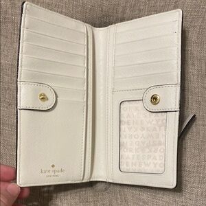 Kate Spade Cream Slim Bi-Fold Wallet